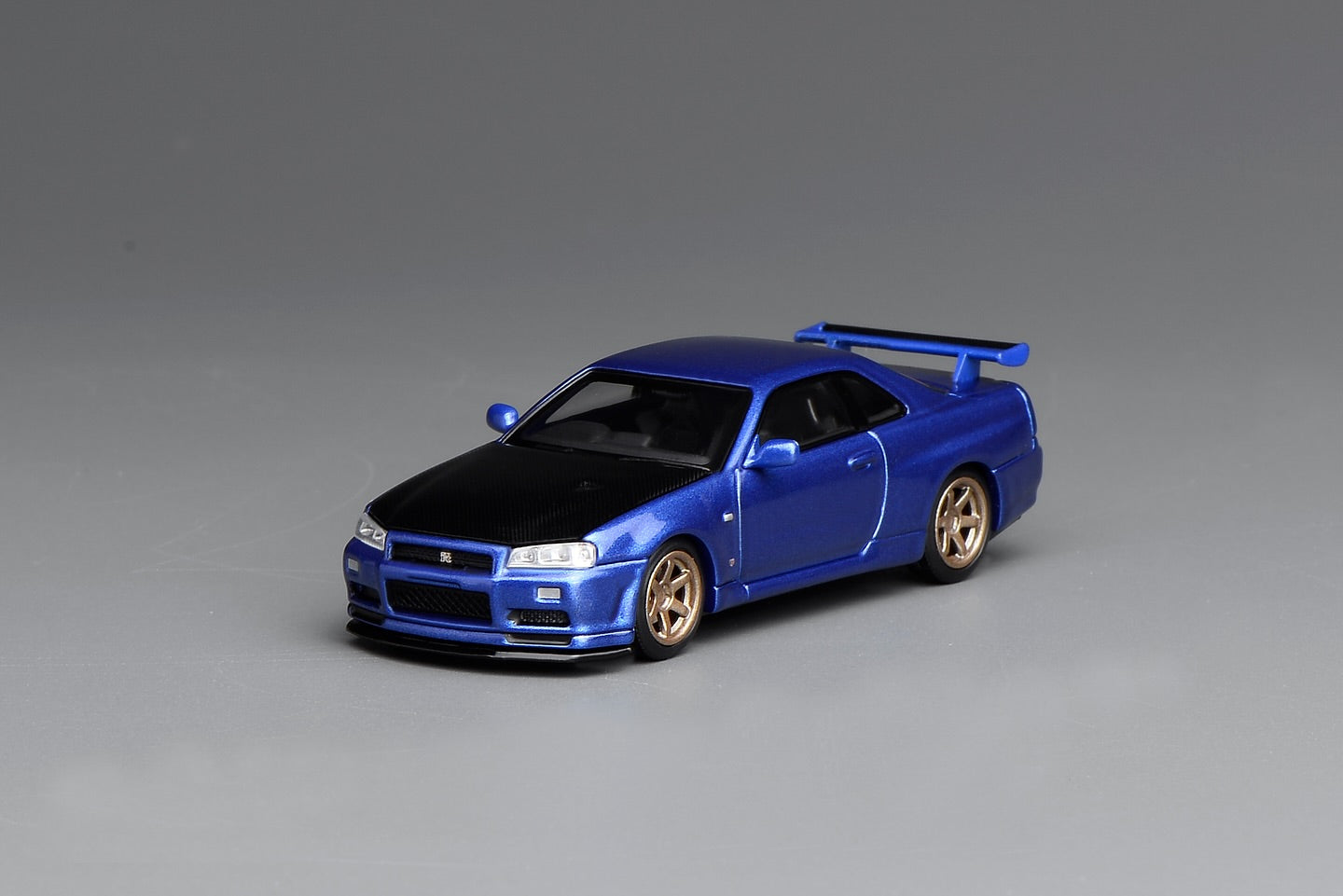 *Pre-Order* MotorHelix Nissan Skyline GT-R (R34) V-Spec II Customized - Bayside Blue w/ Carbon Fiber Bonnet