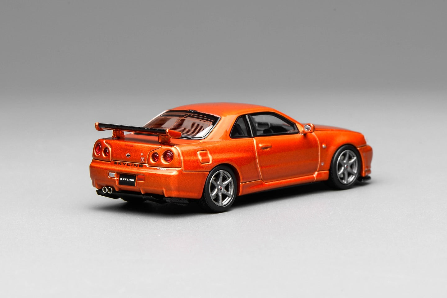 *Pre-Order* MotorHelix Nissan Skyline GT-R (R34) V-Spec II Customized - Metallic Orange