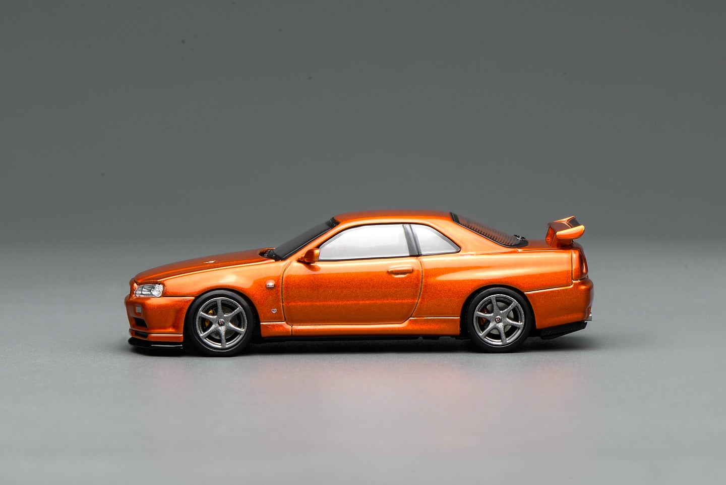*Pre-Order* MotorHelix Nissan Skyline GT-R (R34) V-Spec II Customized - Metallic Orange
