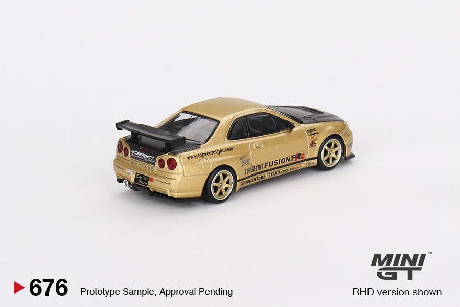 Mini GT No.676 Nissan Skyline GT-R (R34) Top Secret Top Secret Gold - Japan Exclusive