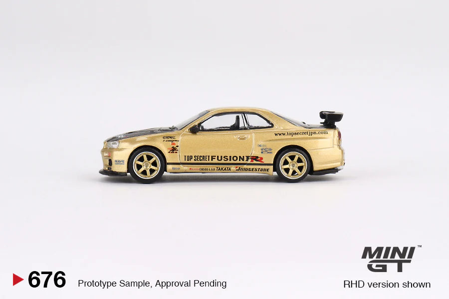 Mini GT No.676 Nissan Skyline GT-R (R34) Top Secret Top Secret Gold - Japan Exclusive