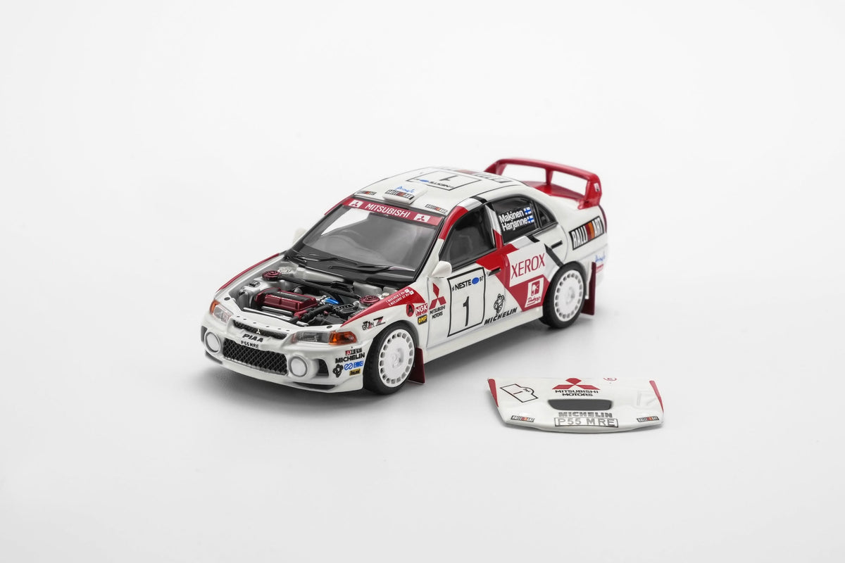 *Pre-Order* MotorHelix - M64030 Mitsubishi Lancer Evolution IV GSR 1997 Finland Rally Winner