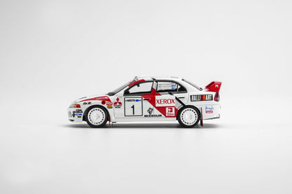 *Pre-Order* MotorHelix - M64030 Mitsubishi Lancer Evolution IV GSR 1997 Finland Rally Winner