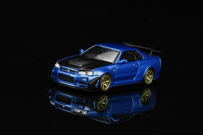 *Pre-Order* MotorHelix M63476 Nissan Skyline GT-R (R34) Customized - Bayside Blue w/ GT Aero Kit
